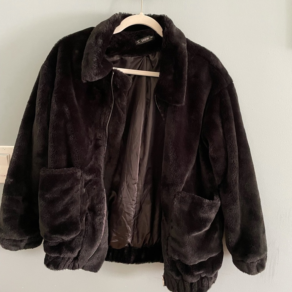 furry black jacket